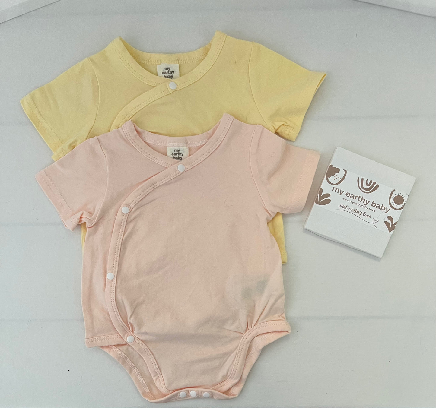 EARTHY SUMMER GIFT SET (two summer onesies, socks, teether, pacifier, hello world)